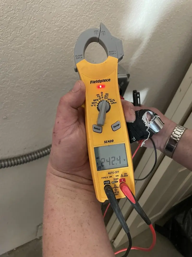 Voltage testing with clamp meter during Circuit Breaker Repair in Pilot Point